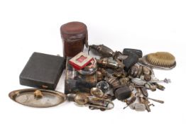 A small group of silverplated and white metal items.