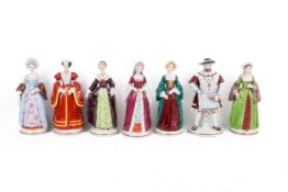 A set of seven Sitzendorf figures modelled as Henry VIII and his six wives.