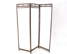 A bamboo three-fold screen frame.