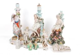 A collection of Continental porcelain figurines.