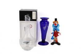 Three contemporary glass pieces.