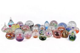 A collection of glass paperweights.