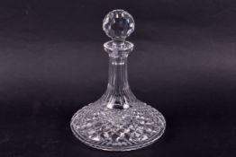 A crystal hobnail cut glass ships decanter with stopper.