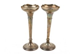 A pair of early 20th century weighted silver spill or bud vases.
