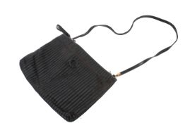 A Fendi black embossed striped leather crossbody bag and a clutch.