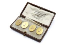 A pair of 9ct gold cufflinks. With engraved initials BJ, hallmarked, gross weight 12.9g.