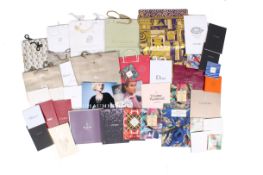 An assortment of designed fashion and jewellery catalogues, brochures and packaging.