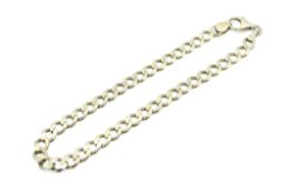 A 9ct gold curb chain bracelet. Hallmarked, width 6mm, length 22.5cm, weight 10.7g.
