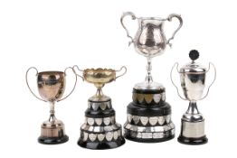 Four silverplated trophy cups. All winners' cups for the Mendip Beekeepers Association, with stands.
