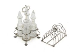 A Victorian silver condiment bottle holder and a toast rack.