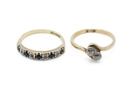 An 18ct and a 9ct gold ring.