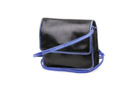 A vintage Maud Frizon black leather handbag.
