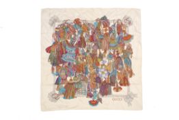 A vintage Gucci silk scarf in the 'Tassel Print'.