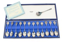 A limited edition boxed set of twelve silver zodiac spoons, designed by David Cornell.