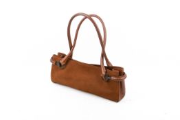 A Gucci 'Baguette' brown suede and leather handbag.