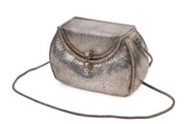 A white metal mesh handbag.