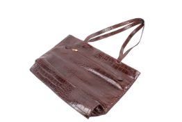 A vintage Harrods brown imitation crocodile skin tote bag.