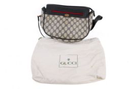 A vintage Gucci coated canvas shoulder bag.