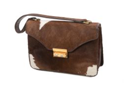 A Mario vintage cow hide handbag.