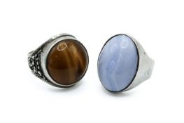 Two large stone set silver rings.