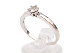 An 18ct white gold diamond solitaire ring.