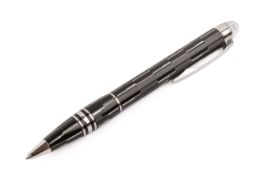 A black and silver Montblanc Starwalker Black Mystery ballpoint pen.