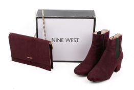 A Nine West handbag and pair of ankle boots.