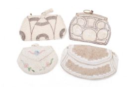 Four vintage beaded handbags.