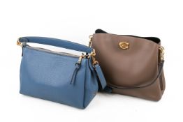 Two Coach leather handbags.