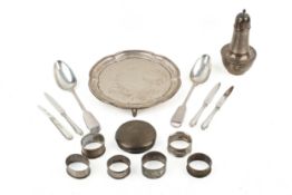A group of assorted silver table items.