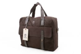 A Timberland brown grained leather briefcase and a Paul Costellor blue silk tie.