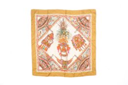 A Gucci silk scarf.
