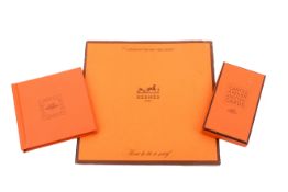 A pack of Hermes knotting cards, scarf booklet and instruction book.