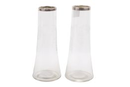 A matched pair of early 20th century silver mounted glass vases.