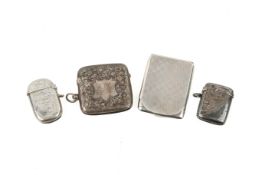 Three Victorian and later silver vesta cases and a matchbook holder.