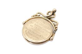 A 9ct gold swing pendant locket.