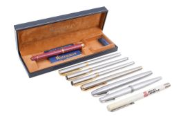 Eight assorted fountain and other pens.