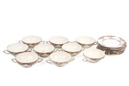 A group of circa 1930 Crown Ducal 'orange tree' soup bowls and saucers, mostly for nine.