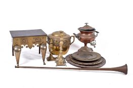 A collection of assorted brass and copperware items.