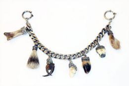 Charivari Kette, 835 Silber, mit 7 diversen Anhängern, L 23 cm, 96,6 gr.