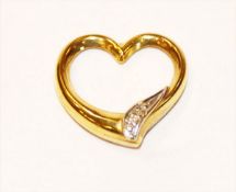 8 k Gelbgold Herz-Einhänger mit in Weißgold gefaßten kleinen Diamanten, 0,66 gr., D 1,5 cm
