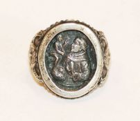 Antoni-Ring mit reliefiertem St. Antonius und seitlichen Putten, 800 Silber, Gr. 53, 7,8 gr.