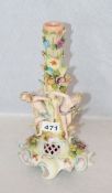 Porzellan Kerzenleuchter mit plastischen Figuren und Blüten, bemalt, H 32,5 cm, leicht bestossen