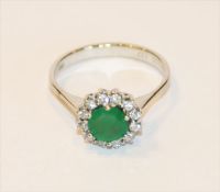 14 k Weißgold Ring mit Smaragd und 12 Diamanten, 2,32 gr., Gr. 52