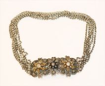 Silber geprüfte Kropfkette mit filigraner Florschnalle, 6-reihig, 46,6 gr., L 35,5 cm