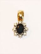 14 k Gelb- und Weißgold Clip-Anhänger mit Safir und 8 Diamanten, L 2 cm, 2,6 gr.
