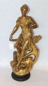 Metallskulptur 'Frau auf Anker sitzend', Anker bezeichnet Rancoulet ?, goldfarben, teils beschädigt,
