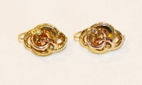 Paar 18 k geprüfte Gelb- und Rosegold Ohrhänger in verschlungener Form, 3 gr., L 2 cm