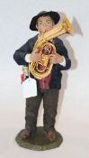 Holzskulptur 'Tubaspieler', fein geschnitzt und bekleidet, am Boden monogrammiert LH für Luis Höger,