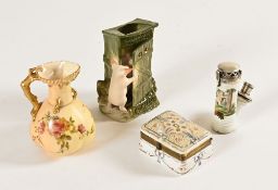 A Royal Worcester blush cream jug, a humorous pig in toilet ornament, a Limoges box and a silver